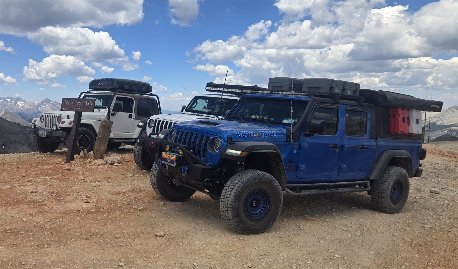 OPENROAD vehicles at Imogene Pass during a Colorado trail trip